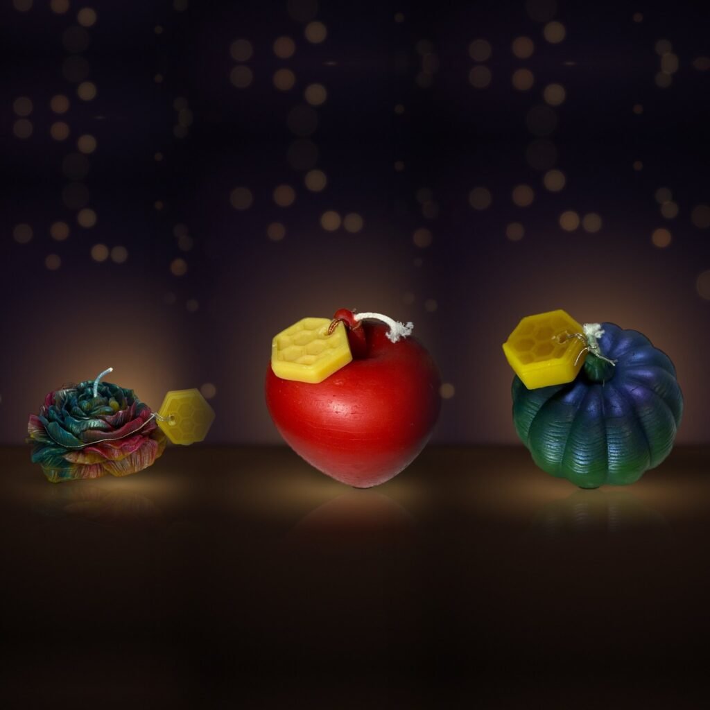 Maine beeswax rose, red apple and medium pumpkin side by side · Sanctuary Mix