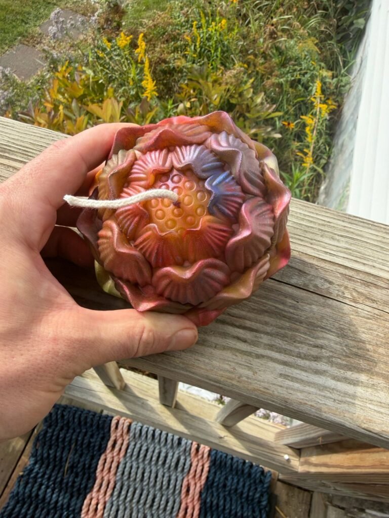 Mica-finished beeswax flower candle by Conway Candle Sanctuary, seen from above